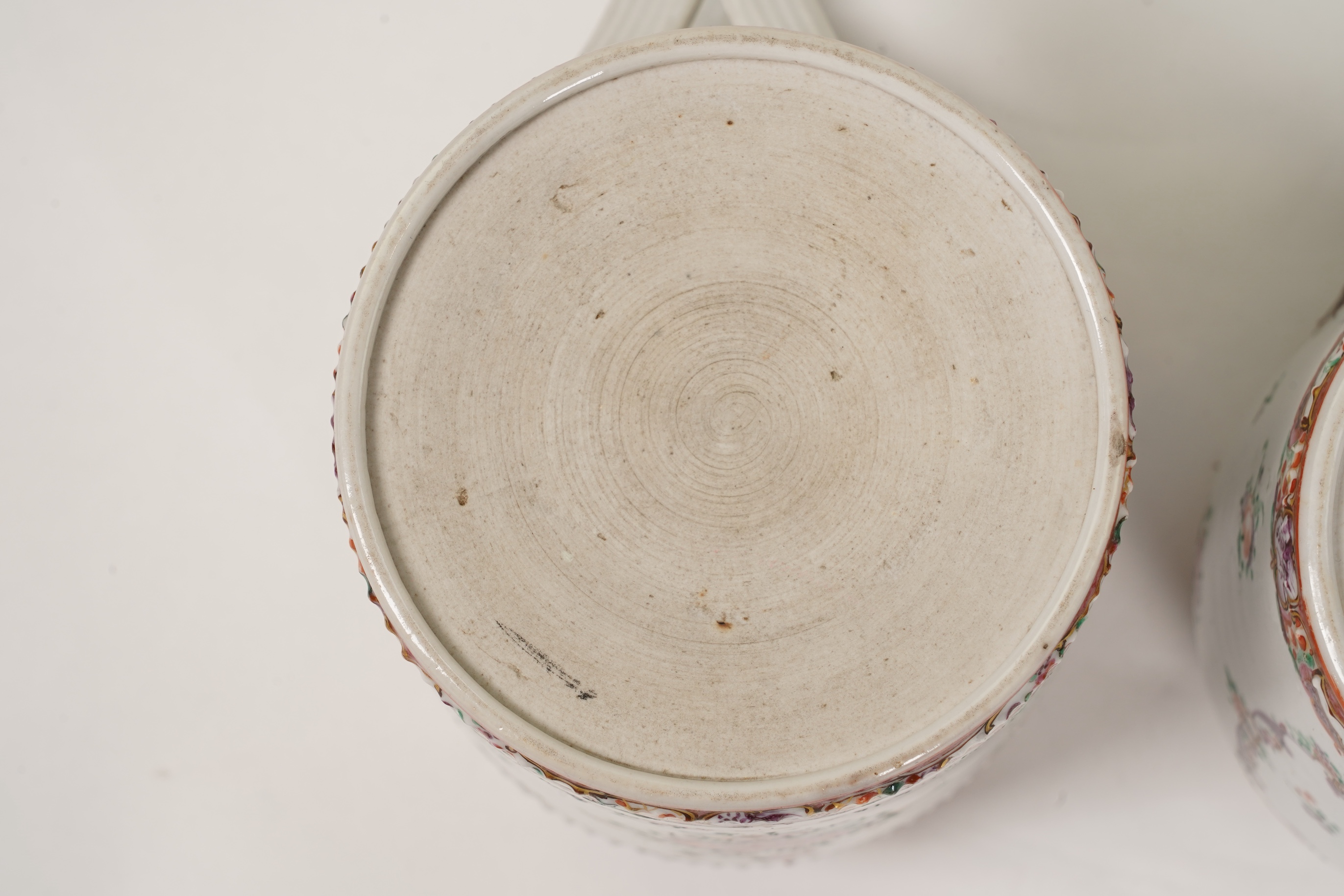 A graduated set of three Chinese export famille rose mugs, Qianlong period